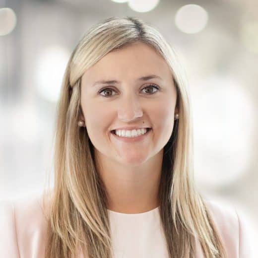 A Smiling headshot of, Meaghan Peloso, CFO, Dream Impact Trust & SVP, Dream Unlimited