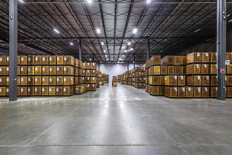 Large warehouse with wooden shipping boxes