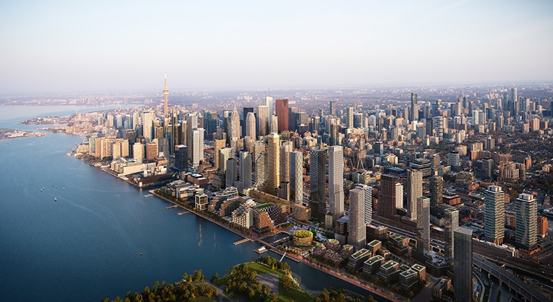 Rendering of Quayside showing a large city landscape with tall skyscrapers, and the city of Toronto nestled against the shoreline of Lake Ontario